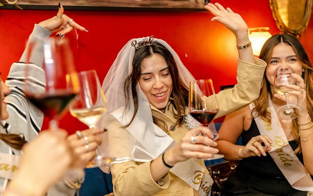 Guests enjoying wine at the Tipsy Tour in Rome.
