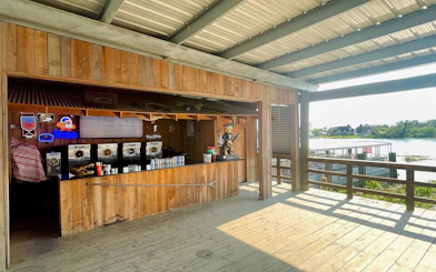 Outdoor refreshment stand at airboat dock, New Orleans swamp tour.