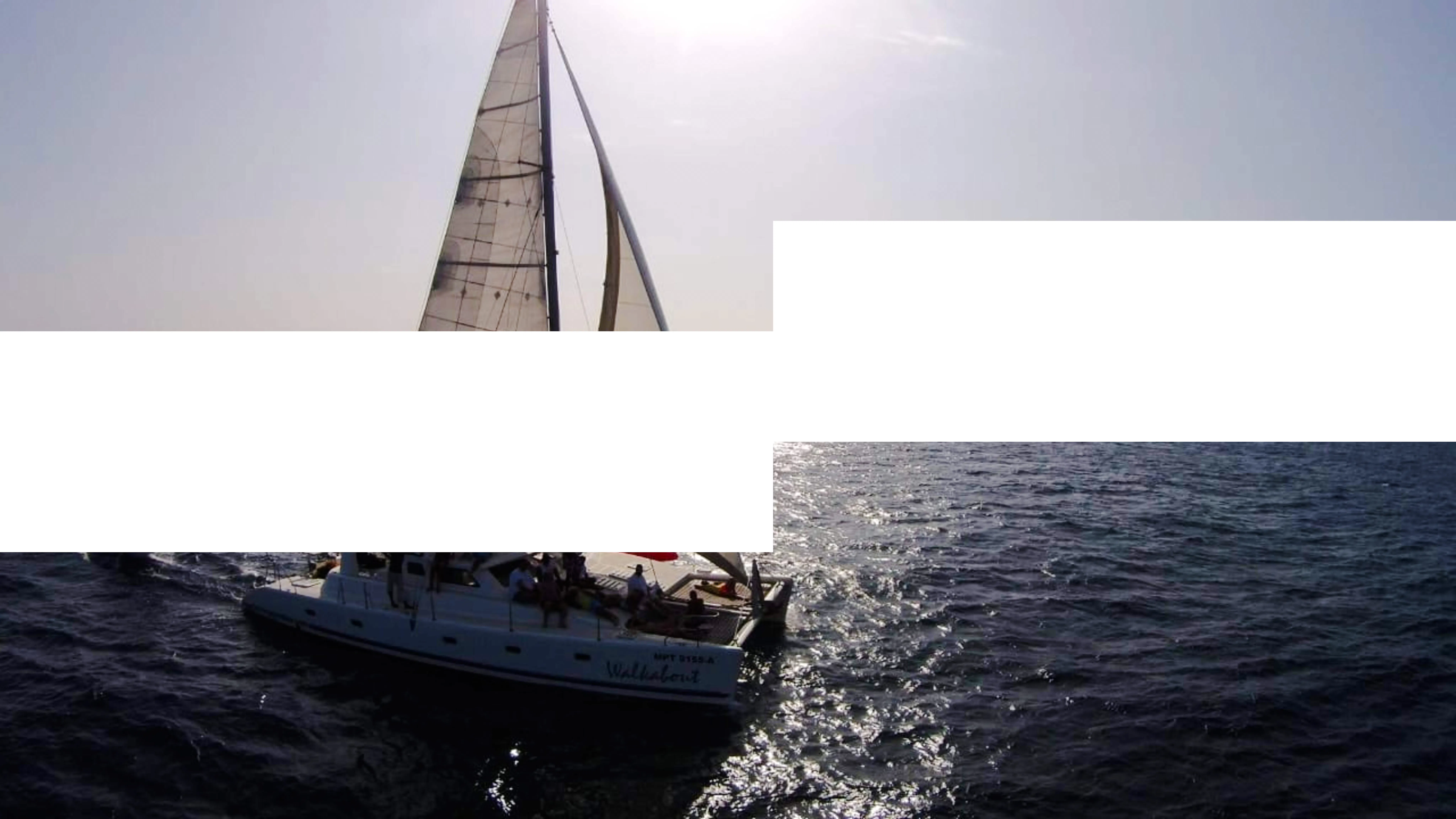 Sailing yacht on deep-sea fishing charter in Zanzibar waters.