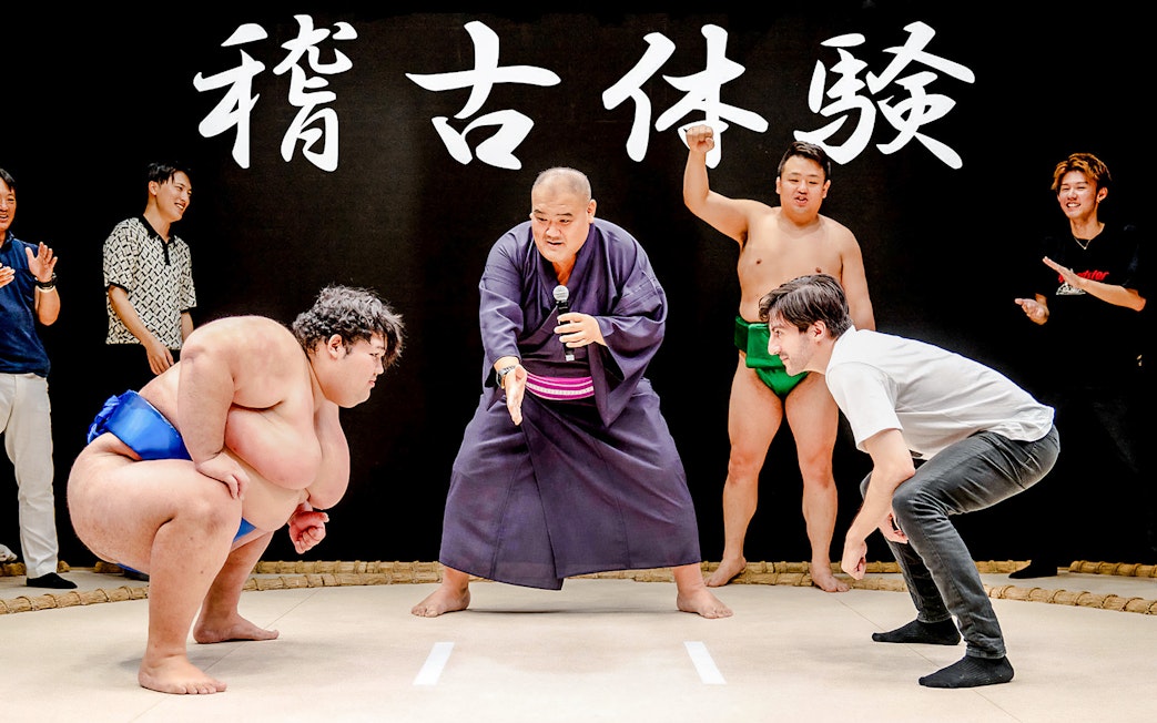 Sumo wrestlers and participant at The Sumo Hall Hirakuza Osaka.