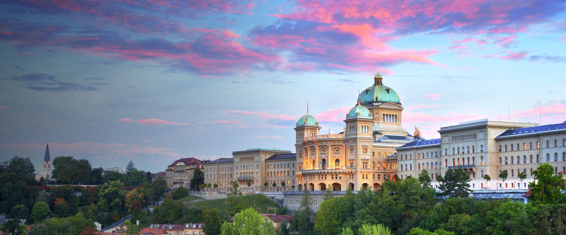 Federal Palace of Switzerland in Bern at sunset.