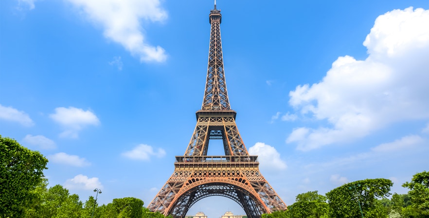 Eiffel Tower with blue sky on a day trip to Paris.
