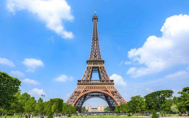 Eiffel Tower with blue sky on a day trip to Paris.