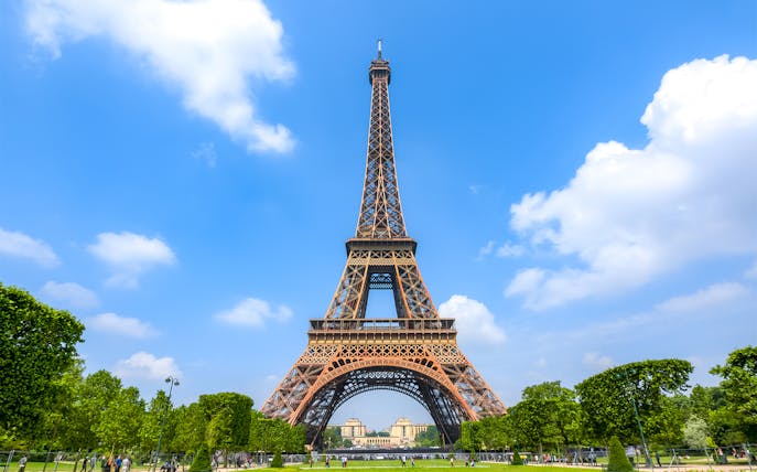 Eiffel Tower with blue sky on a day trip to Paris.