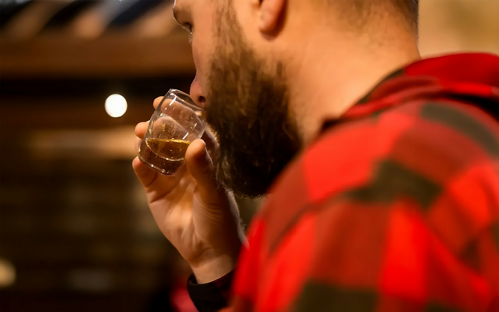 Midleton Distillery whiskey tasting experience with Jameson barrels and glasses.