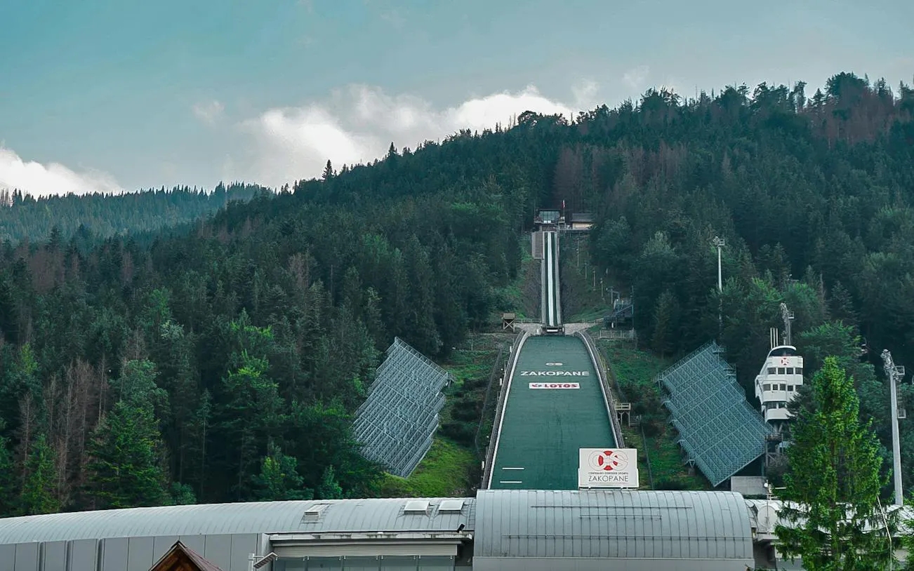 Zakopane ski jump surrounded by forested hills, Poland.