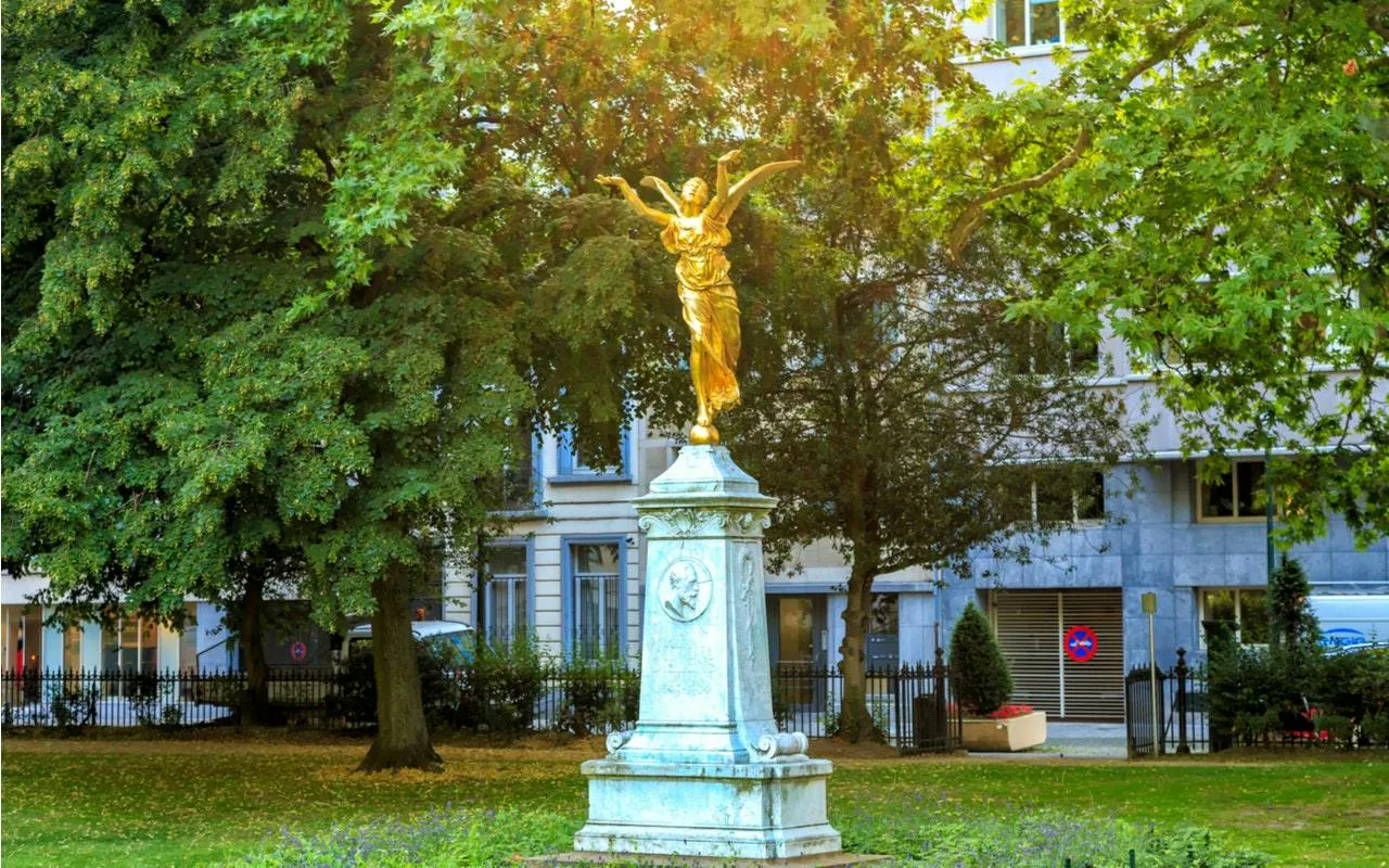 Golden angel statue in a Brussels park, part of the Dutchman's Gold Treasure Hunt tour.