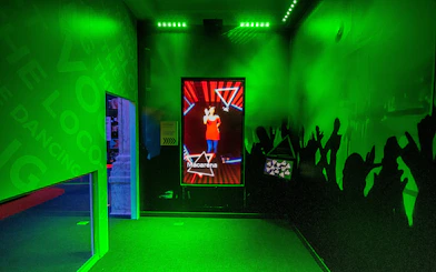 Interactive dance exhibit at The British Music Experience featuring the Macarena.