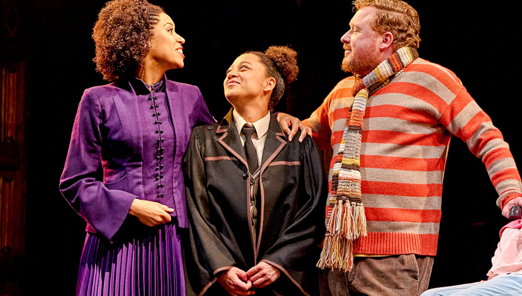 Actors in costume on stage during "Harry Potter and the Cursed Child" performance.
