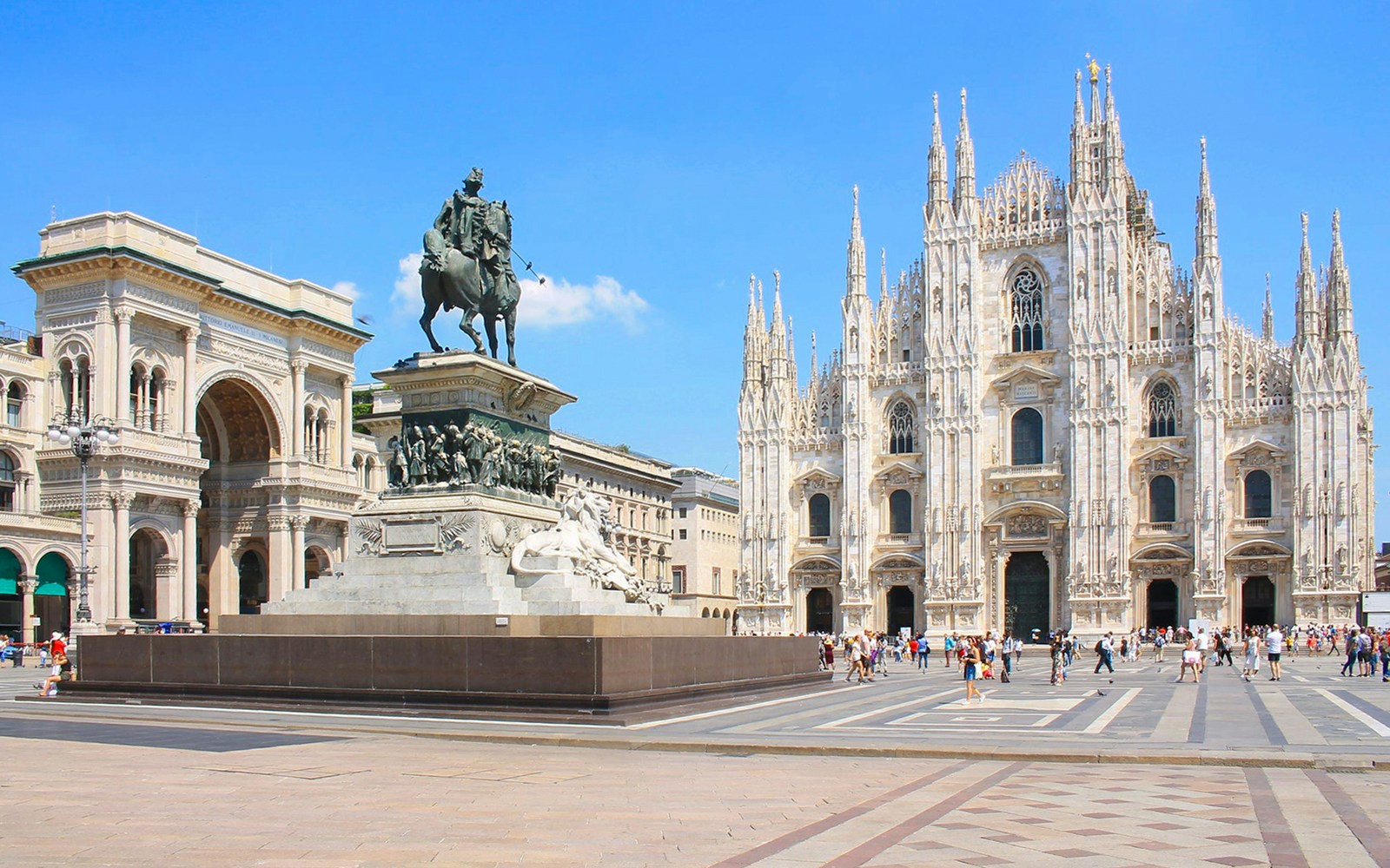 Duomo Milan Cathedral and equestrian statue in the plaza.