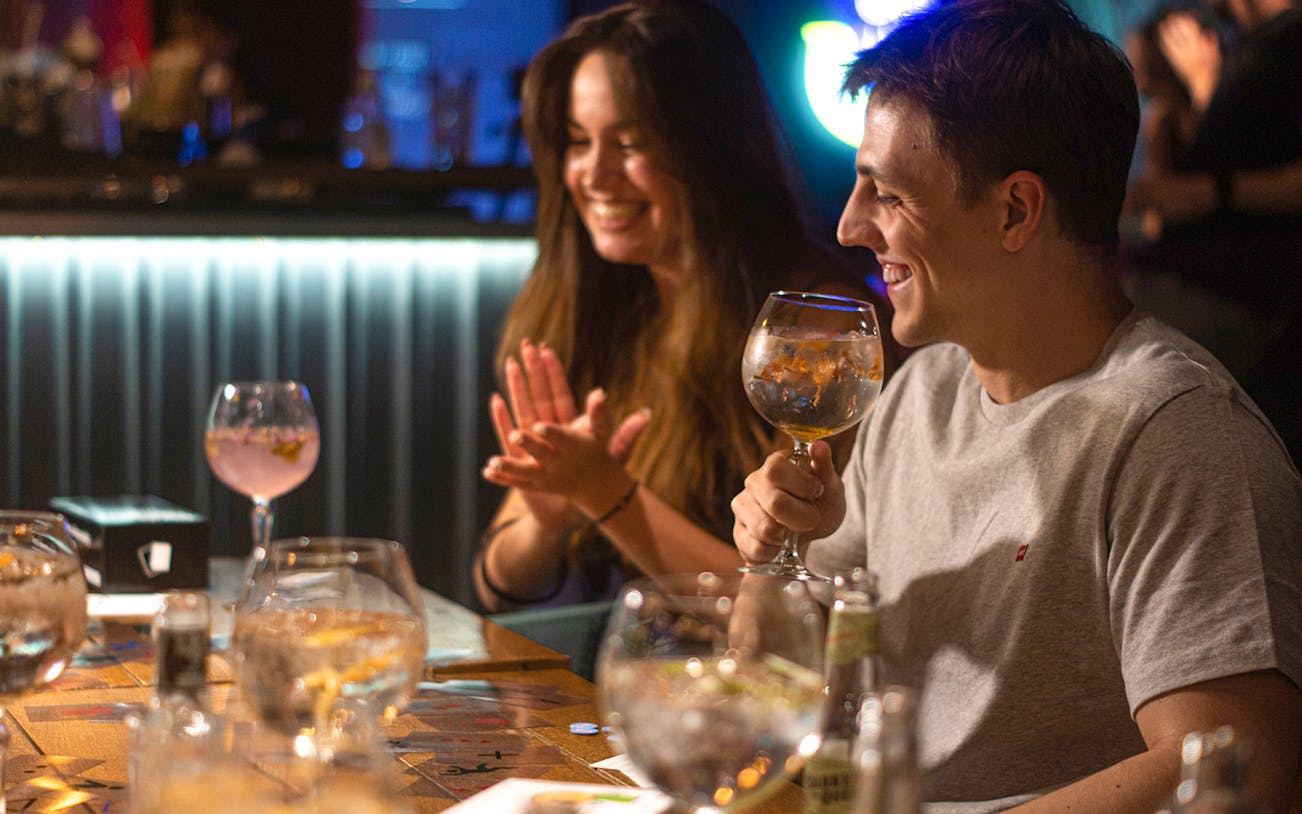 Guests enjoying drinks at Neverland Bar & Escape Room.