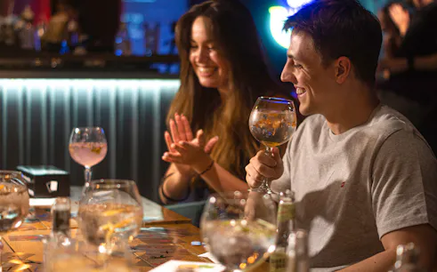 Guests enjoying drinks at Neverland Bar & Escape Room.