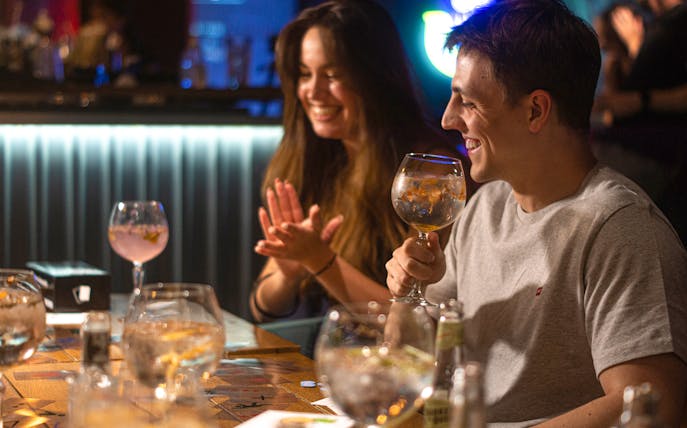 Guests enjoying drinks at Neverland Bar & Escape Room.