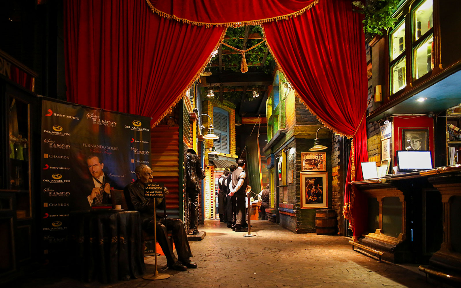 Señor Tango Show interior with red curtains and vintage decor in Buenos Aires.