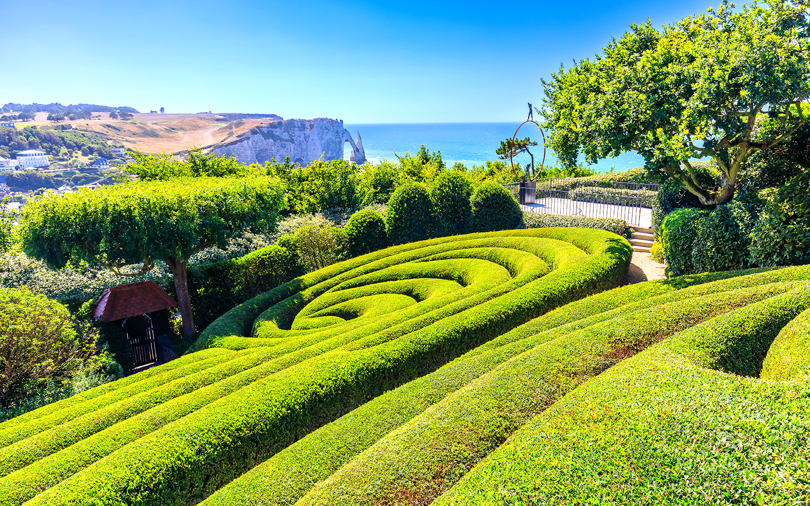 Étretat Gardens in Normandy with unique topiary sculptures and coastal views.
