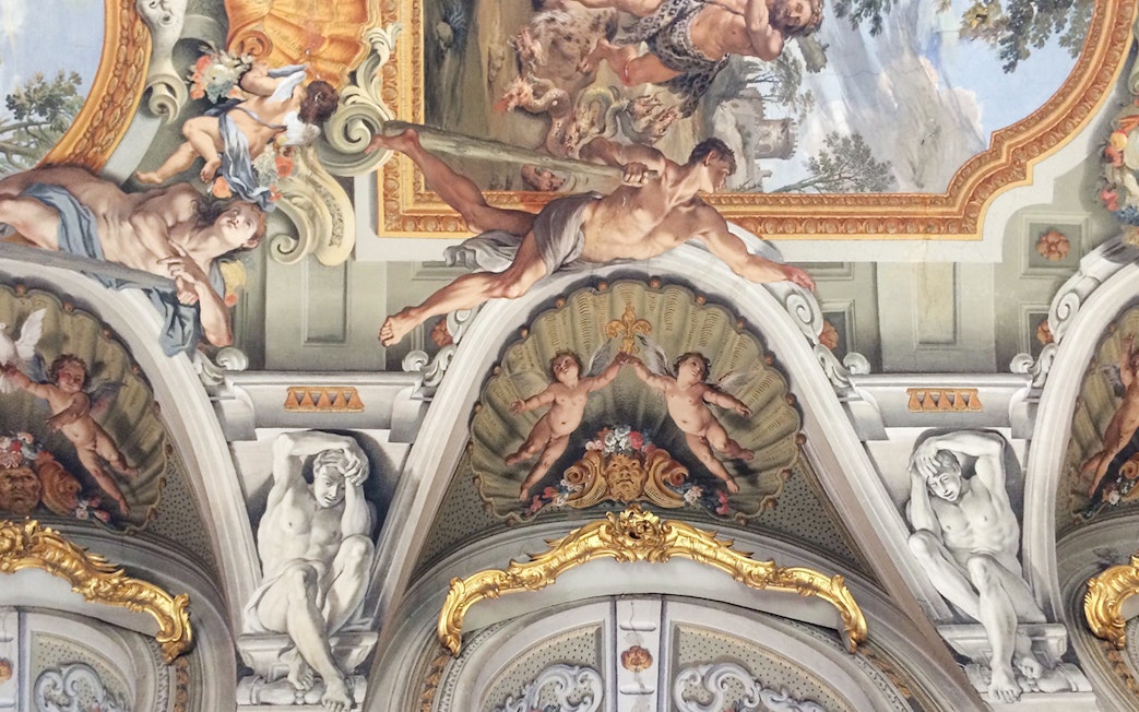 Doria Pamphilj Gallery ceiling fresco with mythological figures and cherubs in Rome.