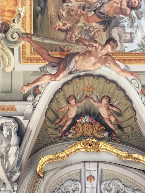 Doria Pamphilj Gallery ceiling fresco with mythological figures and cherubs in Rome.