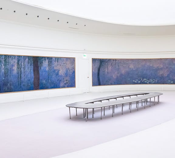 Claude Monet's water lilies painting displayed in Orangerie Museum, Paris, France.