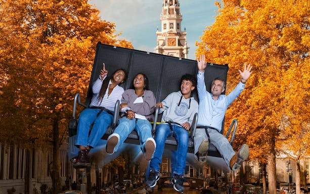 Tourists experiencing 5D ride at This Is Holland Ultimate Flight Experience in Amsterdam.