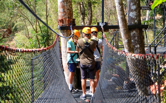 Participants preparing for a zipline adventure in Phuket, Thailand.