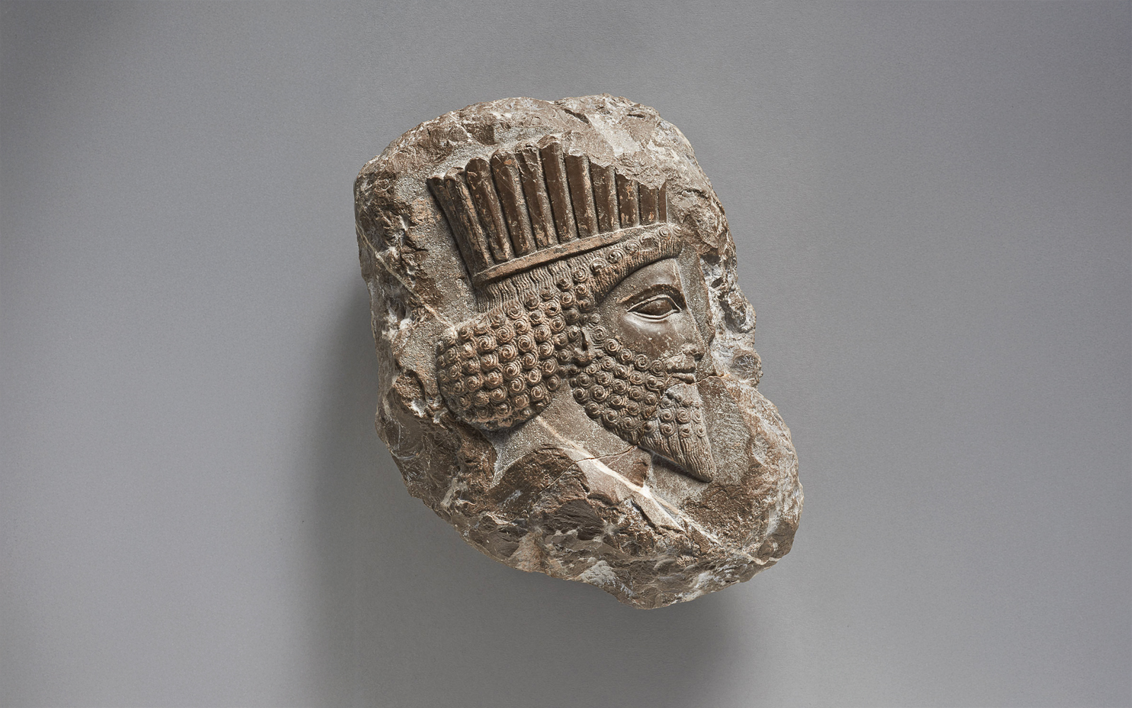 Relief fragment with the head of a Persian nobleman