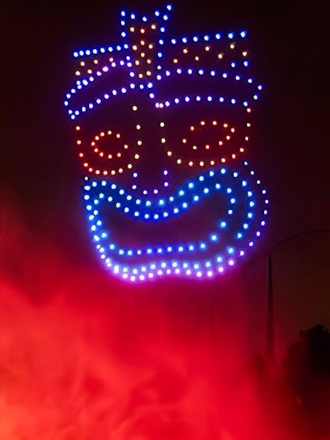 Drone light show forming a face at PortAventura.