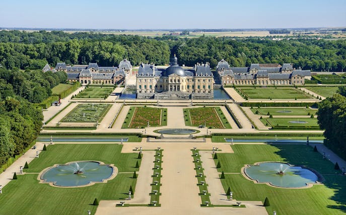 Aerial view of Château de Vaux-le-Vicomte and formal gardens in France.