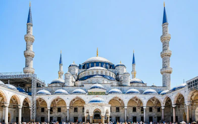 Blue Mosque courtyard with domes and minarets, Istanbul.