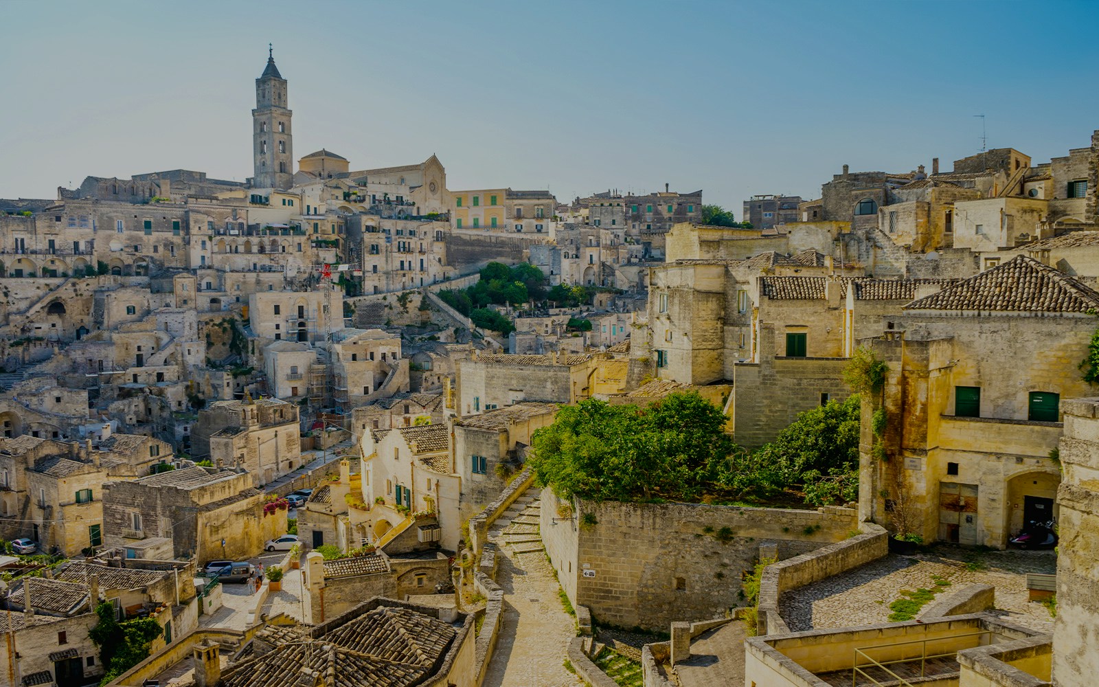 Old town of Matera with stone buildings and narrow winding streets.