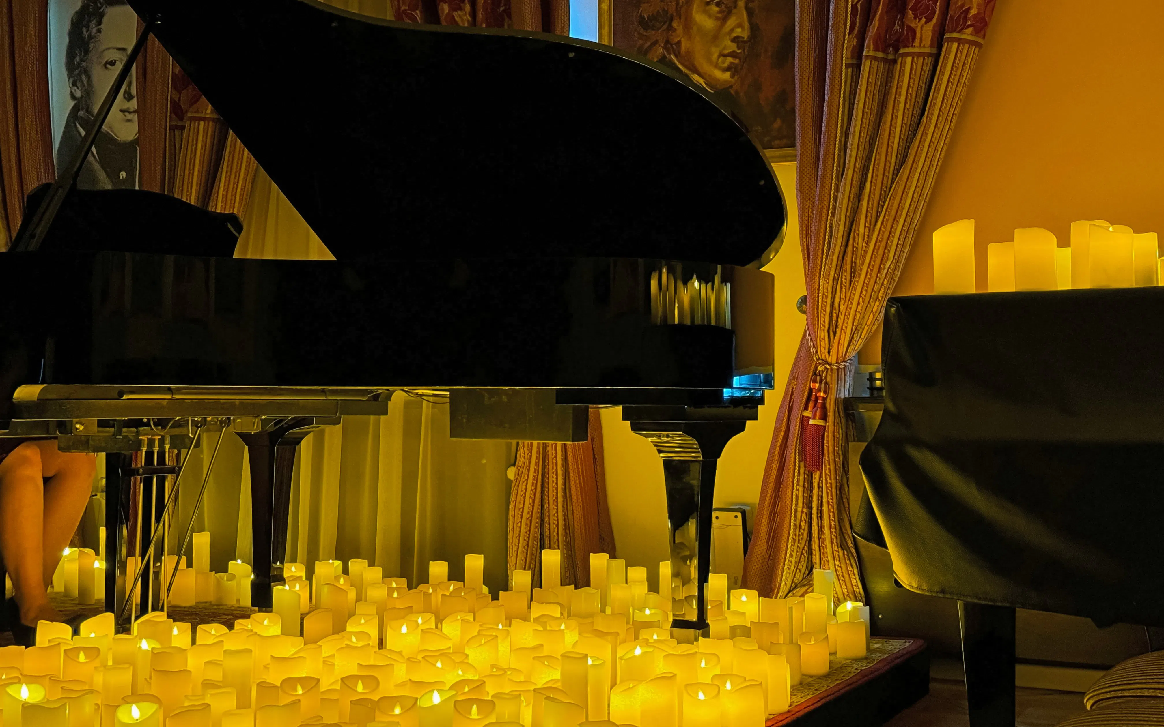 Candlelit piano performance at Chopin Gallery, Krakow, featuring Queen music.
