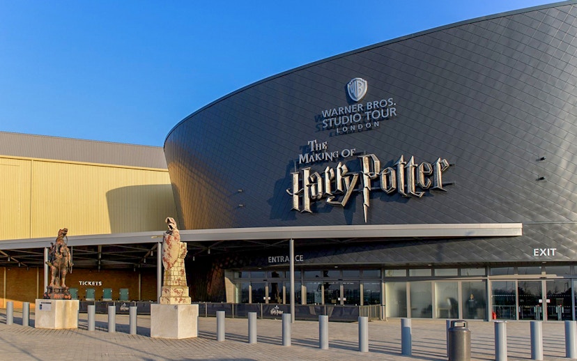Warner Bros Studio Tour entrance in London featuring Harry Potter signage.