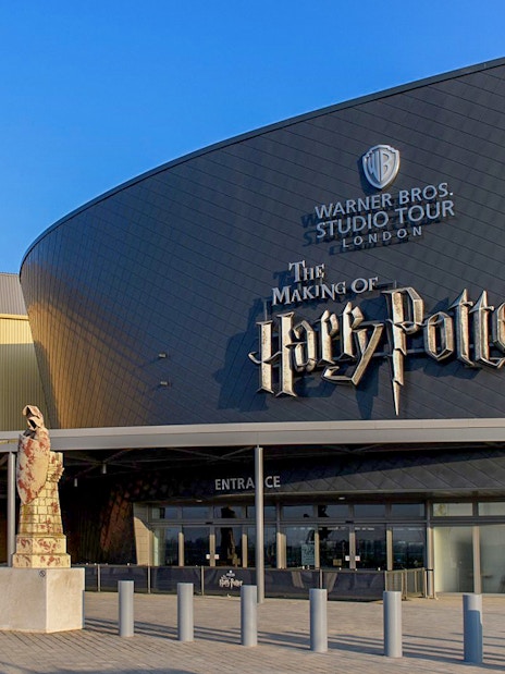 Warner Bros Studio Tour entrance in London featuring Harry Potter signage.
