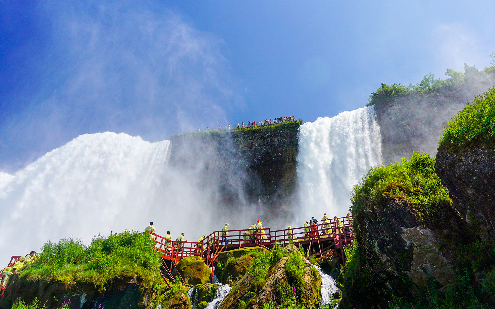 Visitors on wooden walkways at Cave of the Winds, Niagara Falls.