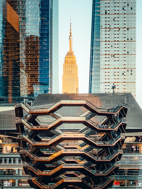 Vessel structure in New York City with skyscrapers in the background.