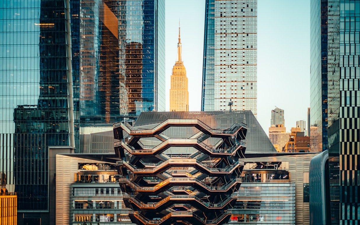 Vessel structure in New York City with skyscrapers in the background.