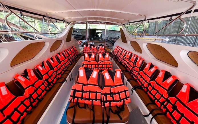 Interior of a speedboat with life jackets, Krabi to Phi Phi Islands tour.