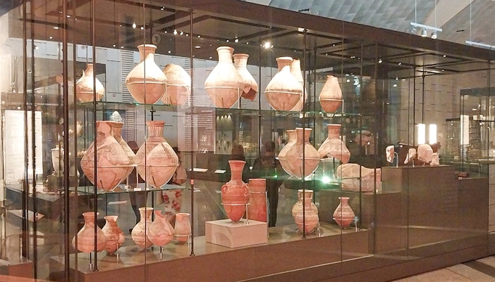 Pottery on display n closed glasses in Grand Egyptian Museum