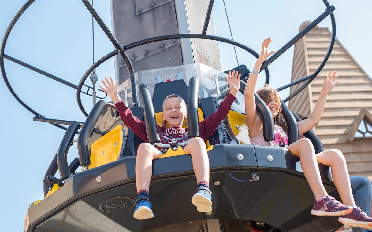 Children enjoying a ride at Land of Legends Theme Park, Antalya.