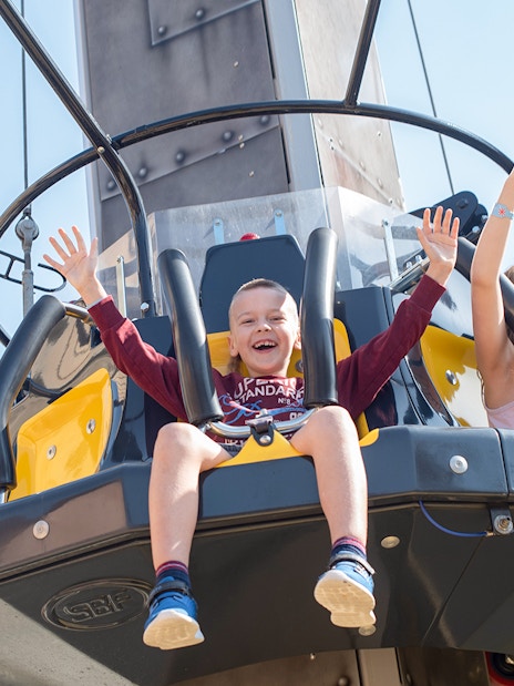 Children enjoying a ride at Land of Legends Theme Park, Antalya.