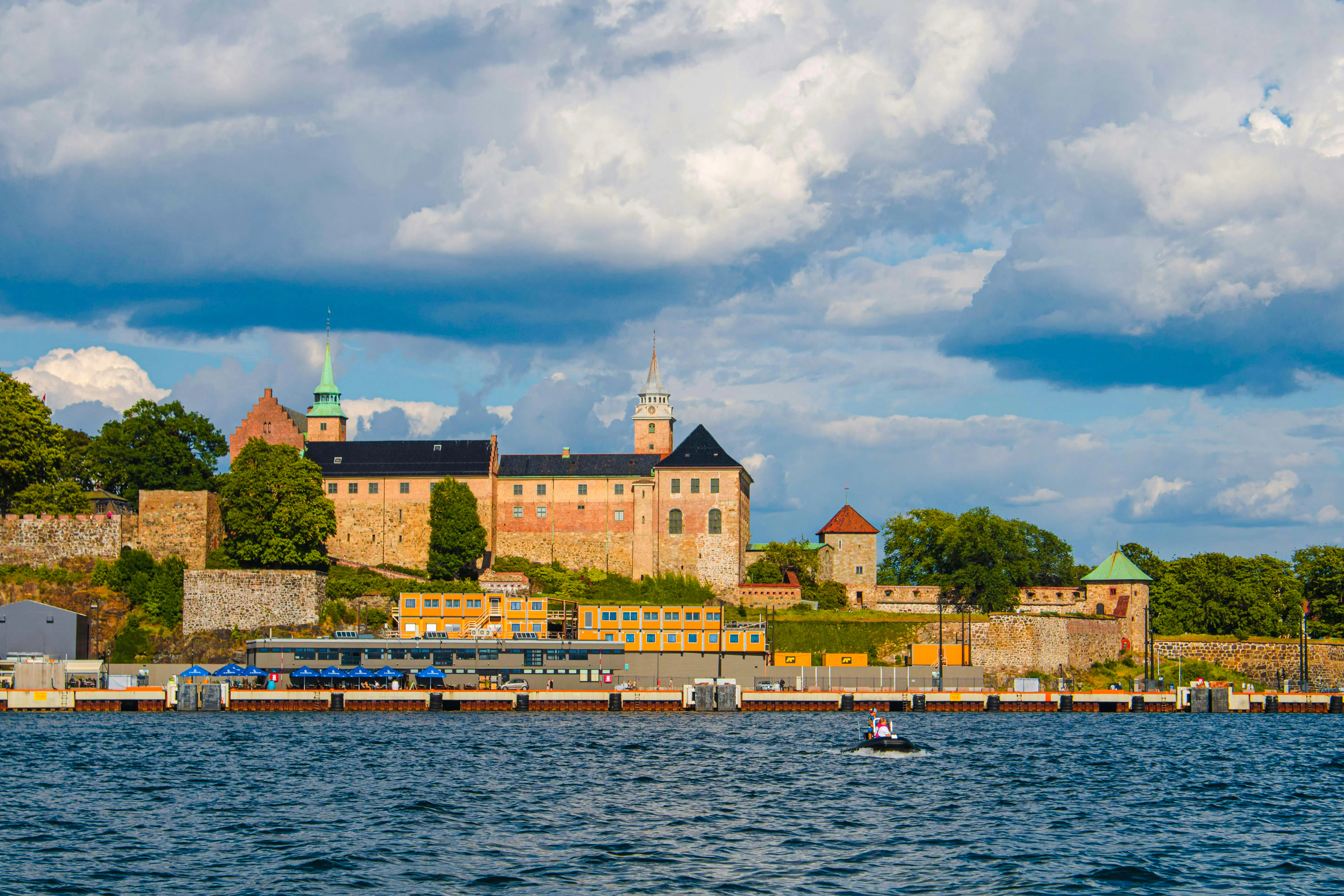 Akershus Fortress viewed from the water, part of the Oslo Essential Highlights Tour.