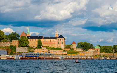 Akershus Fortress viewed from the water, part of the Oslo Essential Highlights Tour.