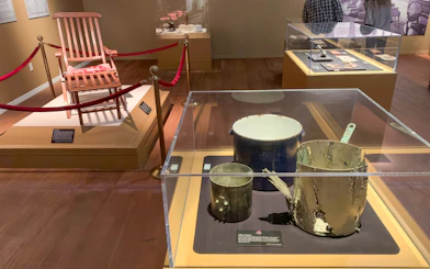 Artifacts from Titanic: The Artifact Exhibition, including a deck chair and cooking pots.