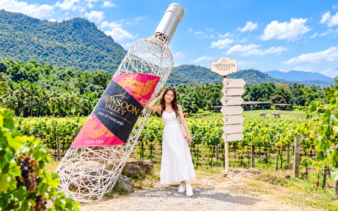 Monsoon Valley Vineyard entrance with large wine bottle sculpture, Hua Hin.