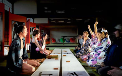 Visitors enjoying a traditional performance at TOEI Kyoto Studio Park.