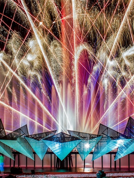 Fireworks display at Wings of Time exhibition, Sentosa Island, at night.