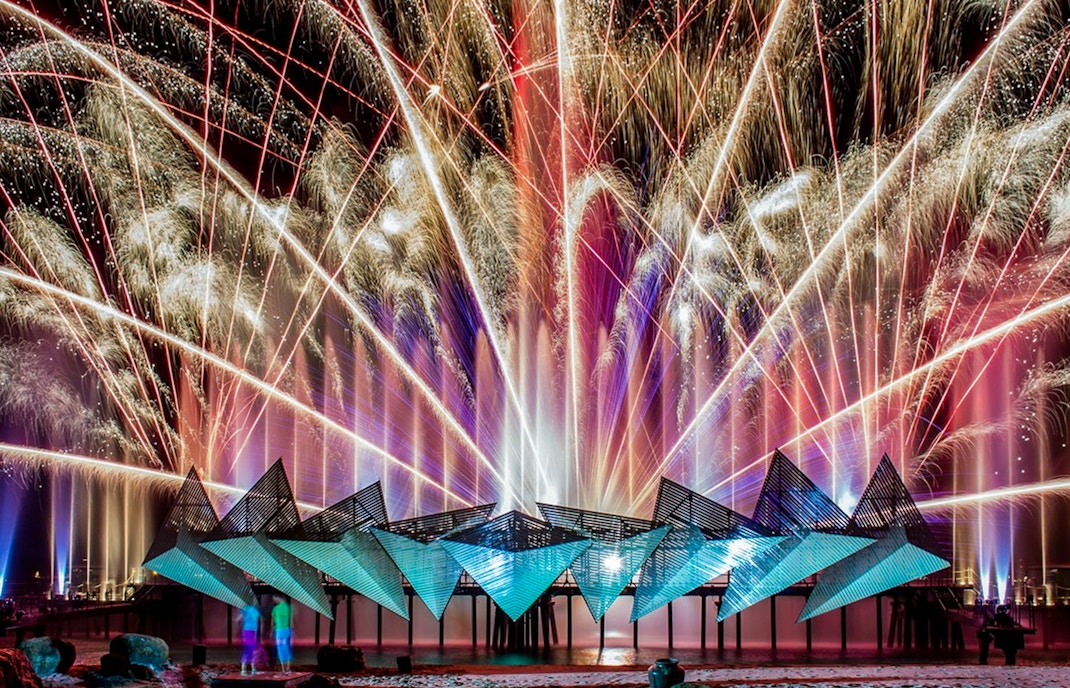 Fireworks display at Wings of Time exhibition, Sentosa Island, at night.