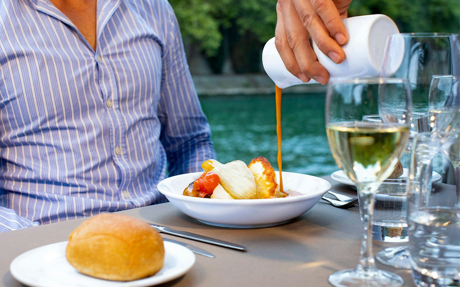 Seine River lunch cruise on Bateaux Parisiens with Eiffel Tower view in Paris.