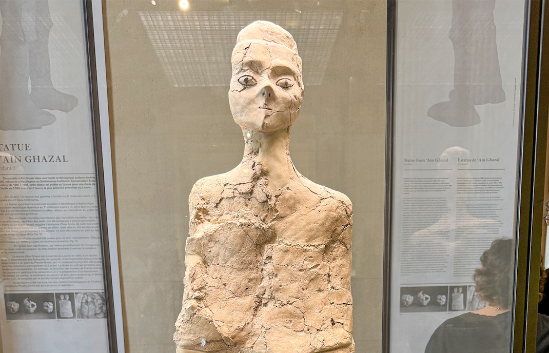 Ain Ghazal Statue at the Louvre Museum, Paris, showcasing ancient Jordanian art.