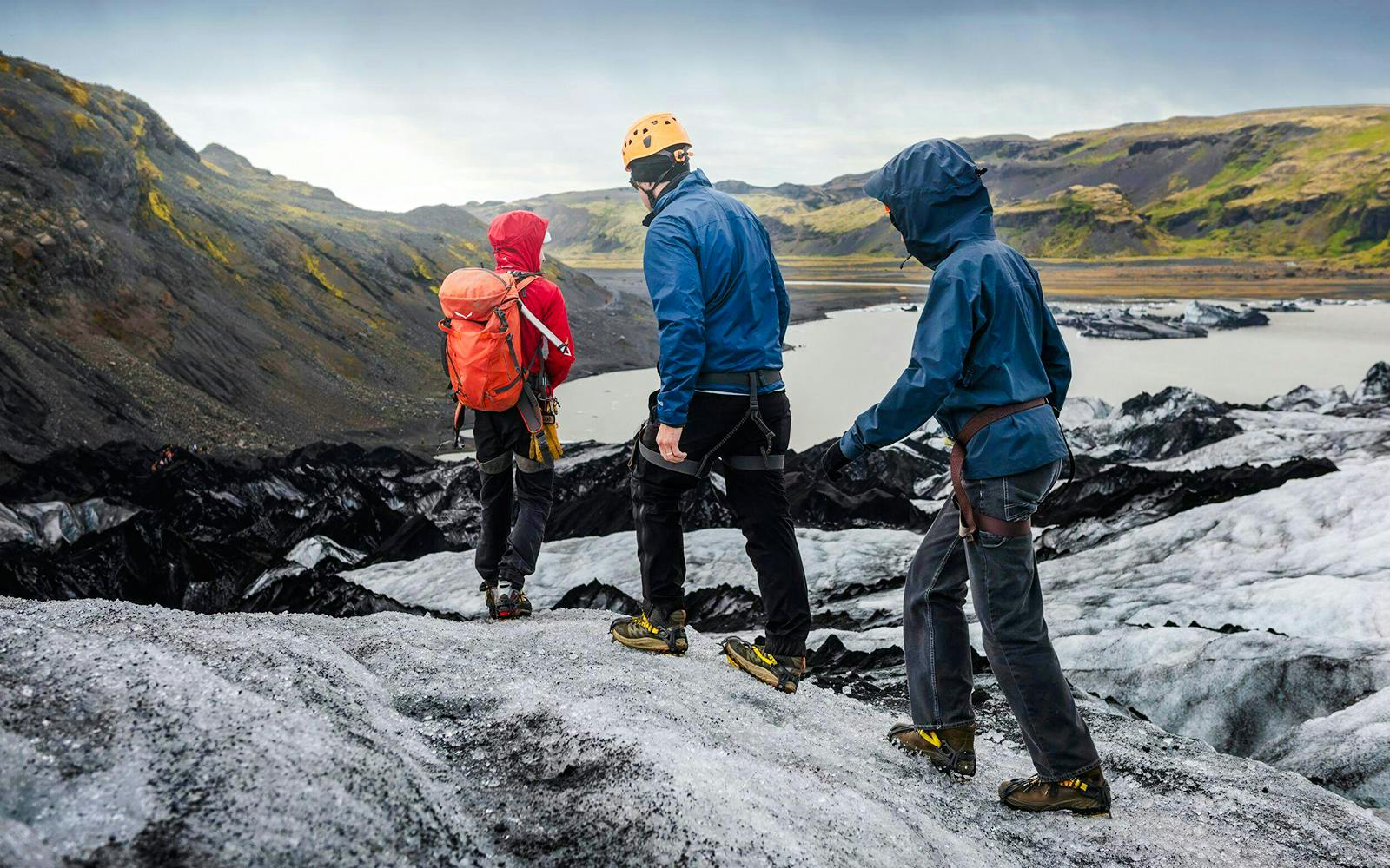 Hikers trekking on Solheimajökill Glacier in Iceland.