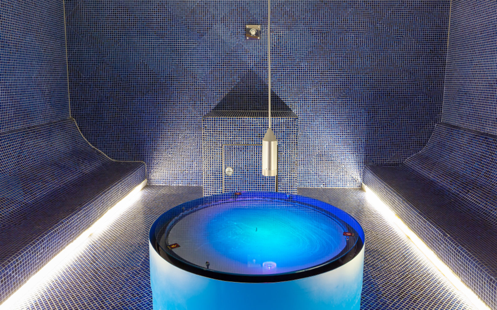 Circular pool in a tiled room at Spa Land Centum City, Busan.